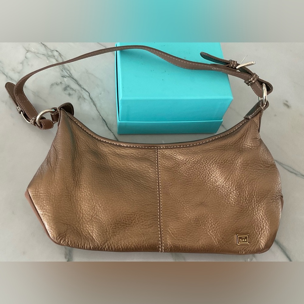 The Sak Metallic Gold Pebble leather bag